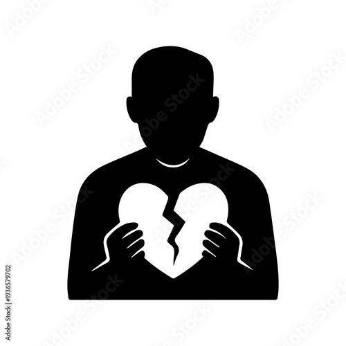 Man silhouette holding broken heart feeling sadness