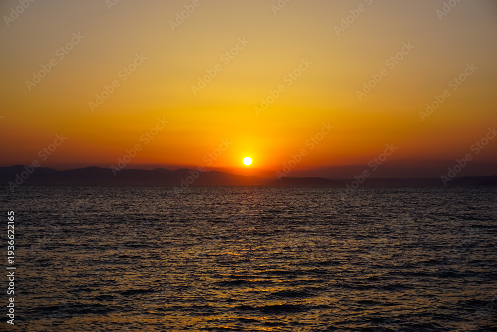 Fototapeta premium Beautiful sunset over the bay