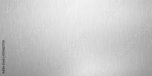 Abstract sleek, brushed metal, a visual ode to industrial textures. With a focus on fine details, it makes the perfect background.