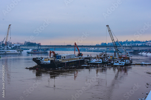  Belgrade Serbia January 09 2026 Industrial Crane Barge and Tugboat