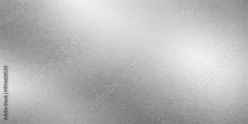 Abstract seamless a meticulously crafted brushed metal texture, exhibiting a luminous sheen, offering a tactile sensation.