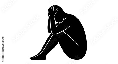 Silhouette of a person curled up in a seated despairing posture