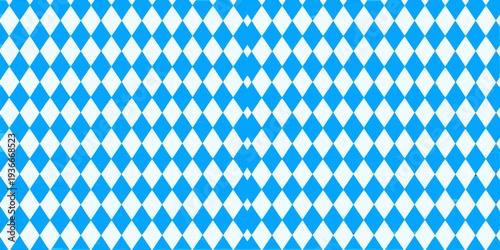 A repeating diamond pattern in shades of blue and white