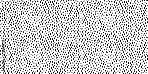 Seamless black droplet pattern on a clean white background texture