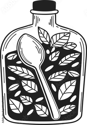 Glass jar filled with tea leaves and a spoon herbal infusion preparation with dried leaves inside bottle