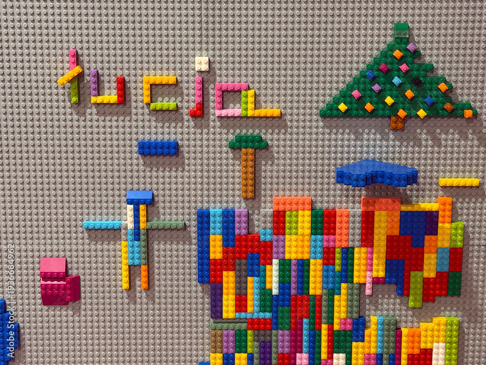 Fototapeta premium Colorful lego brick mosaic on baseplate