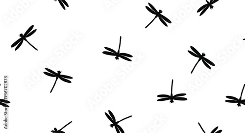 Seamless pattern of black dragonfly silhouettes scattered on a white background for a natural and delicate decorative design.