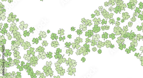 Festive pattern of many light green three leaf clover shamrocks scattered and floating across a white background for Saint Patricks Day.