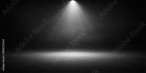 A spotlight illuminates the brushed metallic texture of a polished silver aluminum plate, creating a shiny chrome pattern across the stainless steel wall surface