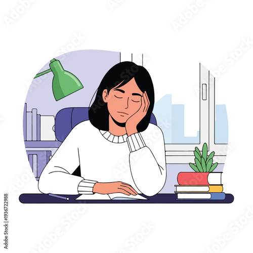 A woman resting her head on her hand at a desk