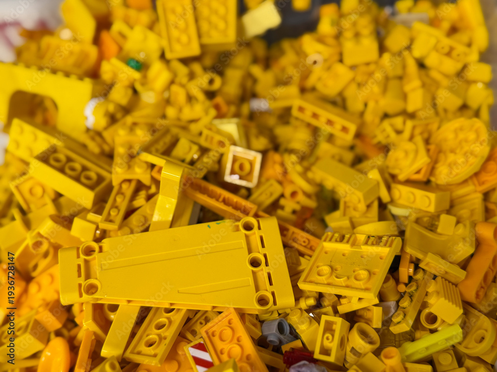 Fototapeta premium Pile of yellow lego bricks
