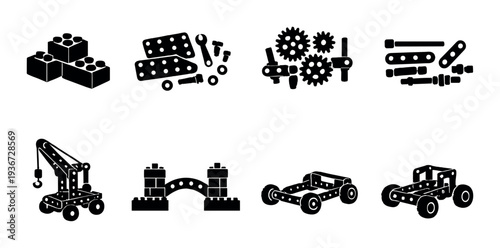 Toy construction parts and assembled models on dark backdrop