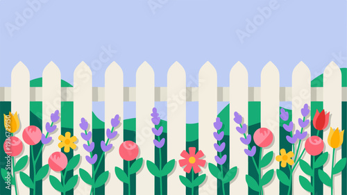 White picket fence with colorful flowers and greenery in a serene garden setting with a clear blue sky