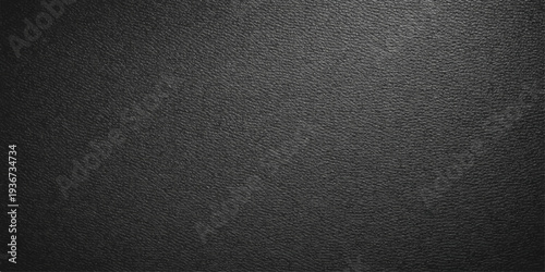 A dark textured black leather surface material features a detailed macro pattern and rough textile structure, creating a grey stone-like backdrop for a sophisticated design cover or wallpaper
