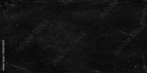 A dark grunge blackboard texture with a rough vintage surface and a blank black chalkboard pattern on an old grey frame backdrop with an alpha channel