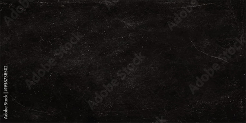 Aged dark grunge wall texture with a rough black and white vintage paper pattern creates a dirty blank chalkboard backdrop for a grey textured design