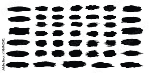A grid of black inkblots on a white background
