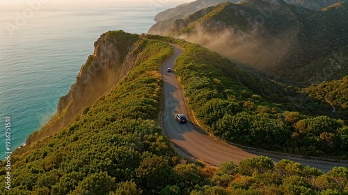 Coastal road weaving through lush green hills, cars navigating the scenic route