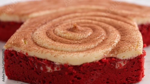 Close up view of a delicious red velvet cake with spiral frosting