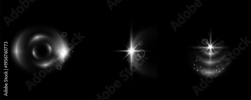 Cinematic lens flare set with glowing starburst lights and circular reflections on black background