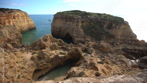 Top down view of the Algarve coast including the Farol de Alfanzina lighthouse 