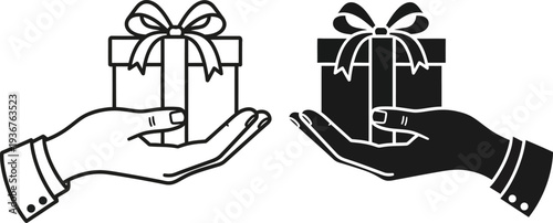 Silhouette of hands exchanging gifts in a symbolic gesture of sharing and giving
