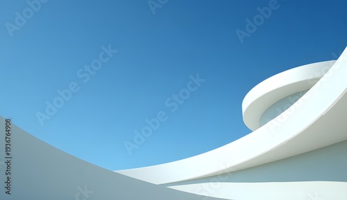 Close up view of white curved architectural detail against deep blue sky representing minimalist style and futuristic building design for luxury real estate or modern construction advertising