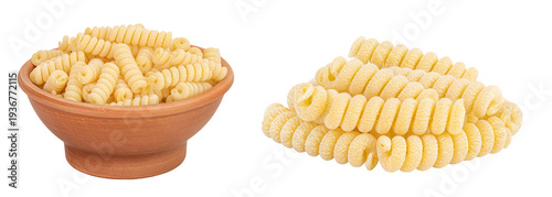 Italian spiral shaped pasta, Fusilli bucati macaroni in ceramic bowl, isolated on white background