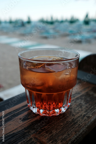 Aperol Spritz at the Beach – Mediterranean Sundowner – documentary style, real world, authentic situation, natural light, genuine moment captured by human photographer, no ai