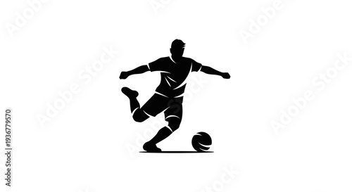 Silhouette of a soccer player kicking a ball.