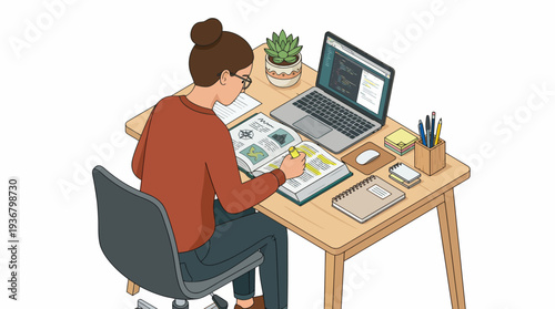 Woman working on a project at her desk with laptop and papers.