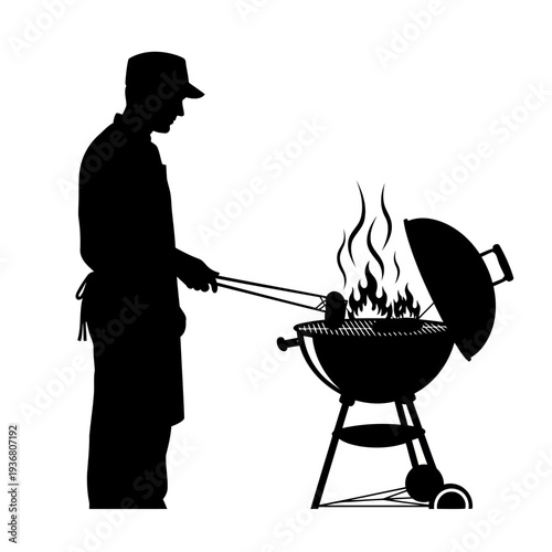 A man grills food on a barbecue in a black silhouette