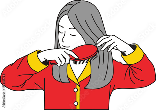 Person wearing red pajamas gently combs their long gray hair with a red oval brush while looking down in concentration.