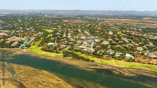 Luxury homes and golf course near lagoon