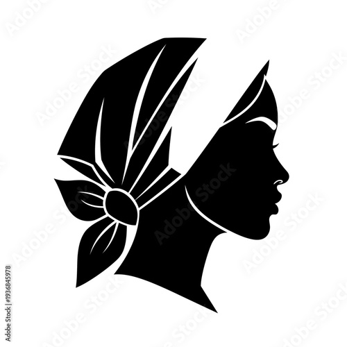 Silhouette of a woman wearing a headscarf