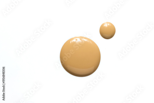 Liquid Foundation Drops on White Background