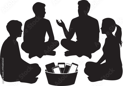 Family sitting in circle with phones in basket for digital detox day