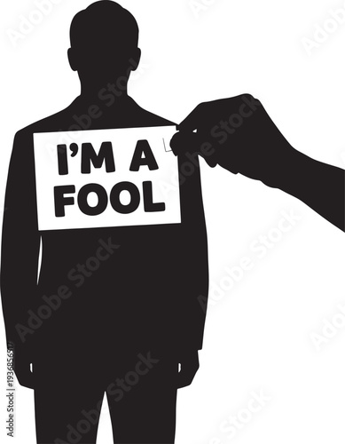 Hand attaches an 'I'm a fool' sign to a man's back, a classic prank representing a joke, trick, or april fools day humor