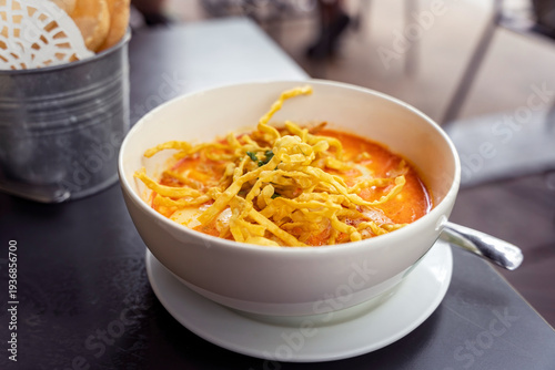 Vegetarian Northern Thai khao soi soup with egg protein and crispy noodles on top, Chiang Mai, Thailand