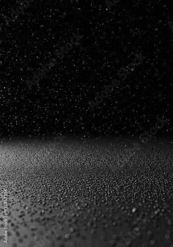 A field of tiny, randomly scattered black particles on a clean, empty surface, providing a perfect background canvas. Abstract texture ,canvas ,digital ,clean