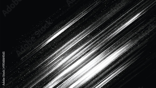 Bright white streaks of light on dark background with scattered white dots and particles