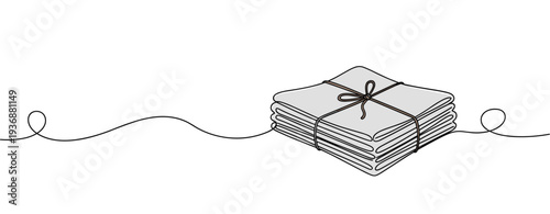 Stacked newspapers tied with string on white background. no editable stroke