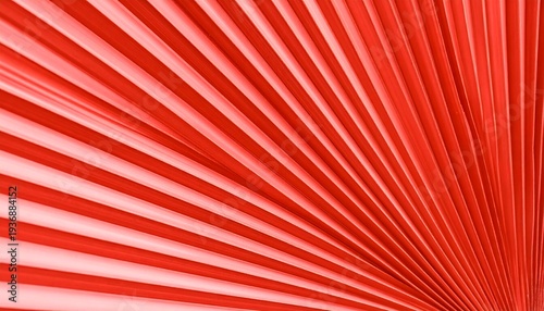 An abstract composition showcases radiating linear segments of a vibrant reddish-orange hue, creating a dynamic and textured visual