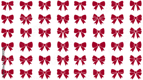 A pattern of red bows arranged against a backdrop. Each bow is intricately tied, adding a touch of elegance to the overall arrangement. The bows appear uniform in shape.