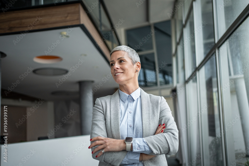 custom made wallpaper toronto digitalConfident mature businesswoman looking away in modern office