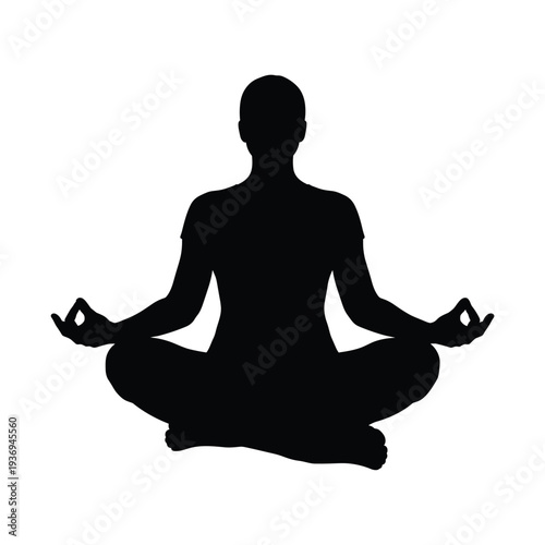 Serene silhouette of a person meditating in lotus position