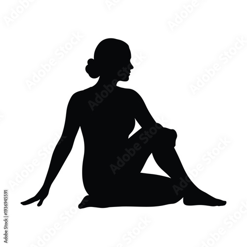 Serene woman in meditative pose on floor