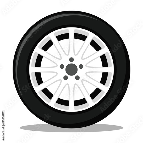 Close up of a sleek car wheel with black tire and silver alloy rim