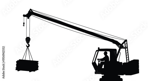 A stark black silhouette of a construction crane lifting a heavy load of stacked materials sharply defined silhouette
