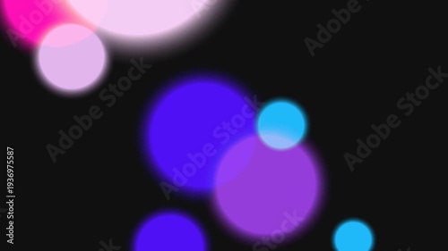 Colorful Blurred Circles on Black Background.